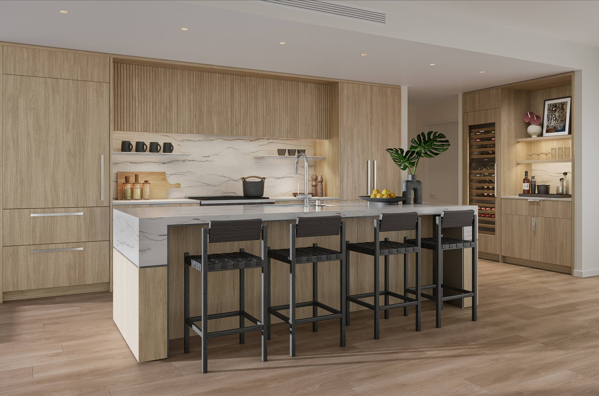 Kalae住宅的厨房有木制橱柜和岛，采用浅色方案。