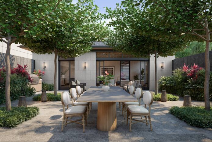 Mālie Courtyard with dining table, chairs, and grill setup for entertaining.