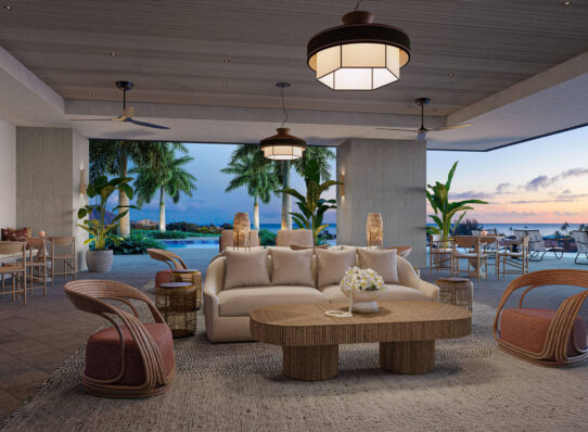 The Kalae Owners Lounge, a covered, but open-air lounge space with comfortable and inviting furniture adjacent to the pool and harbor views.
