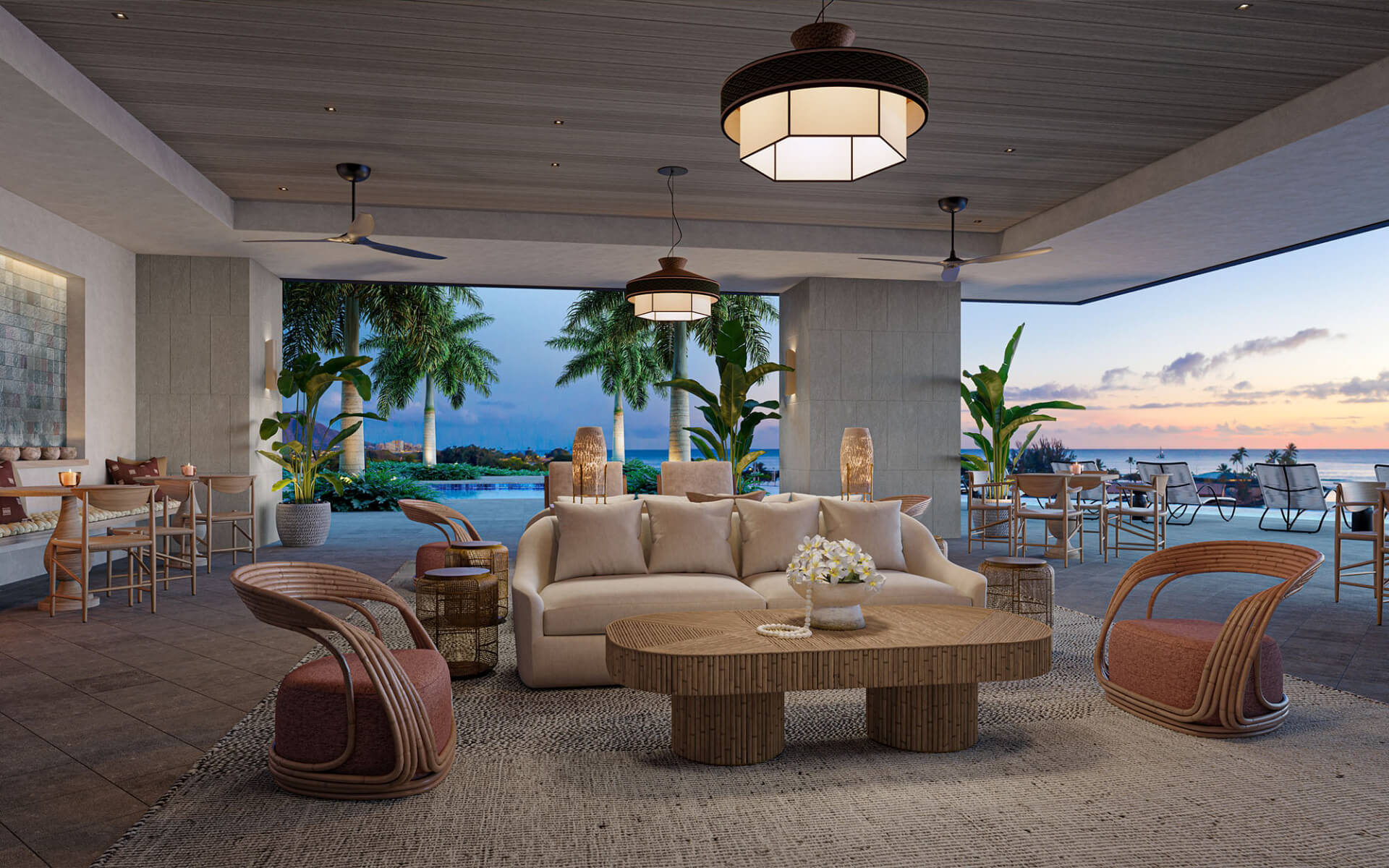 The Kalae Owners Lounge, a covered, but open-air lounge space with comfortable and inviting furniture adjacent to the pool and harbor views.