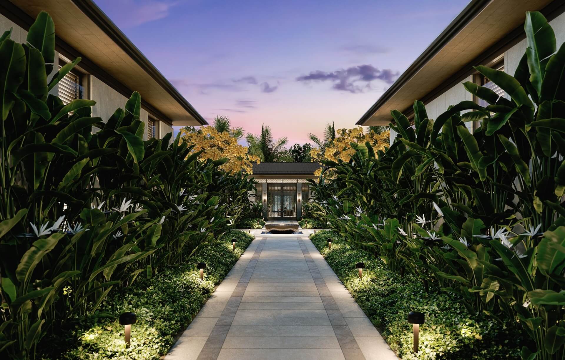 Lush, plant-filled pathway to Mālie Courtyards at Kalae.